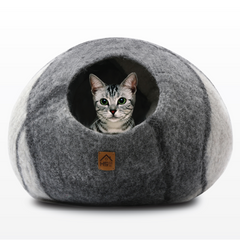 Handcrafted Wool Cat Cave: A cozy retreat for your feline friend. Made from natural wool, this cave provides warmth and security for cats to snuggle and rest. Perfect for promoting relaxation and reducing anxiety in you