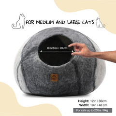 Handcrafted Wool Cat Cave: A cozy retreat for your feline friend. Made from natural wool, this cave provides warmth and security for cats to snuggle and rest. Perfect for promoting relaxation and reducing anxiety in you