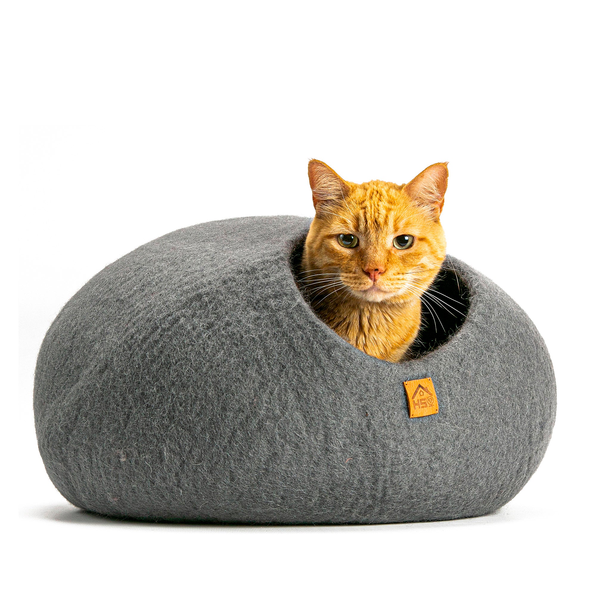 Handcrafted Wool Cat Cave: A cozy retreat for your feline friend. Made from natural wool, this cave provides warmth and security for cats to snuggle and rest. Perfect for promoting relaxation and reducing anxiety in you