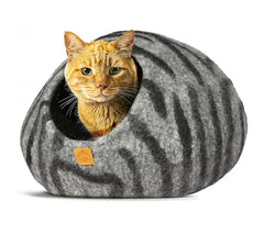 Handcrafted Wool Cat Cave: A cozy retreat for your feline friend. Made from natural wool, this cave provides warmth and security for cats to snuggle and rest. Perfect for promoting relaxation and reducing anxiety in you